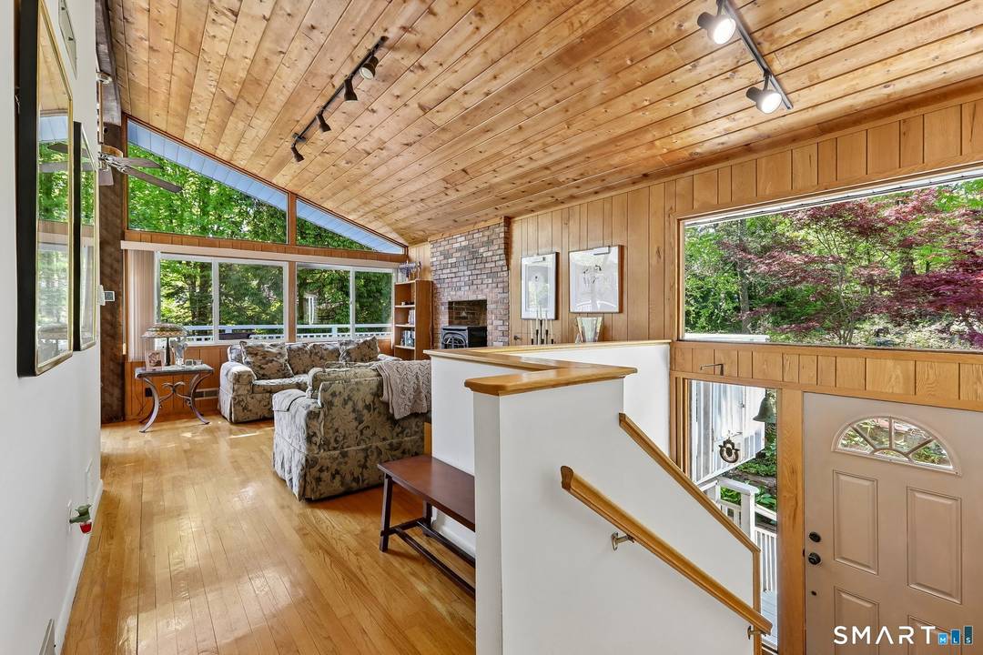 Set within a desirable gated community in western Connecticut, this striking contemporary home offers the perfect blend of style, comfort, and convenience.