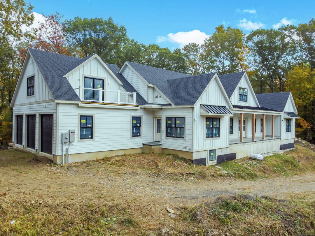 Welcome to 255 Great Plain Road a custom designed residence offering rare opportunity and refined potential.