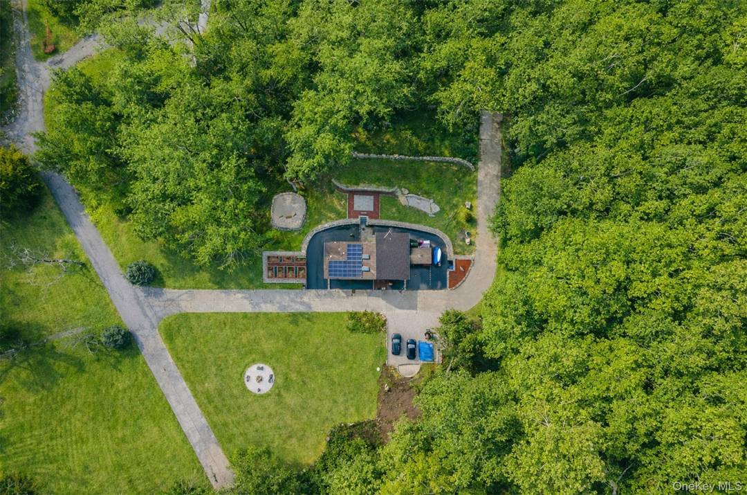 Tucked away on a private dead end road shared by only eight homes, this beautiful contemporary residence offers a rare blend of privacy, convenience, and opportunity.