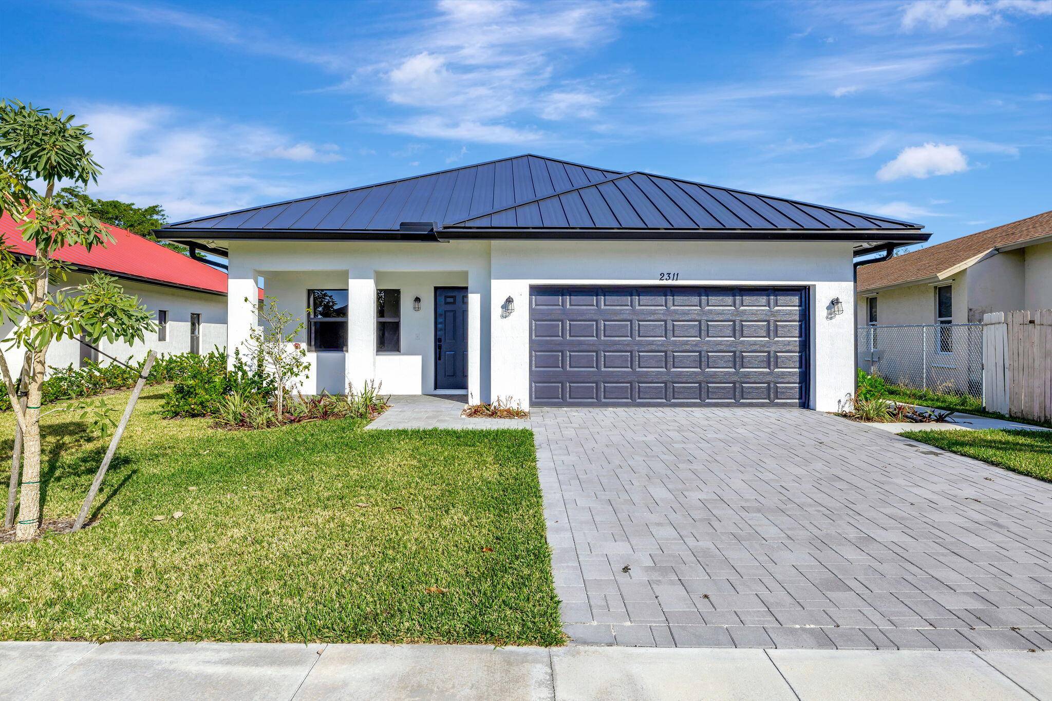 Welcome to paradise in the heart of Delray Beach with no HOA.