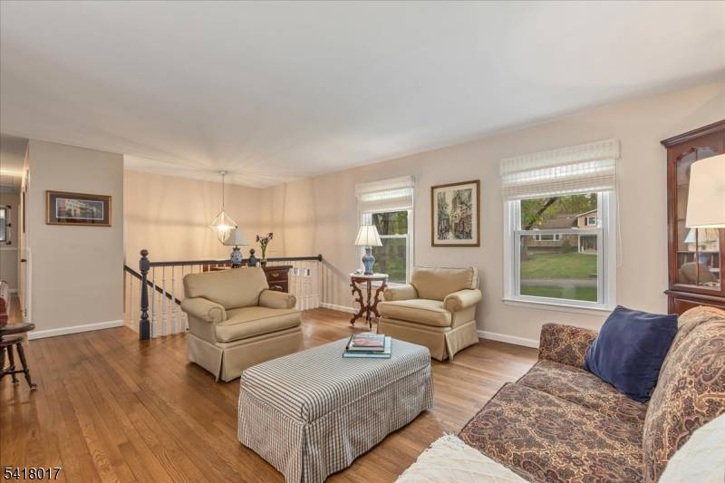 Move right into this meticulously renovated 4 bedroom, 3 bath residence, perfectly positioned just 0.