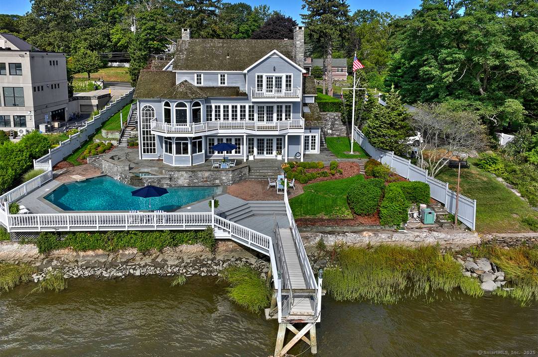 Welcome to this stunning waterfront retreat on the scenic Housatonic River, offering panoramic views, luxury, and comfort.