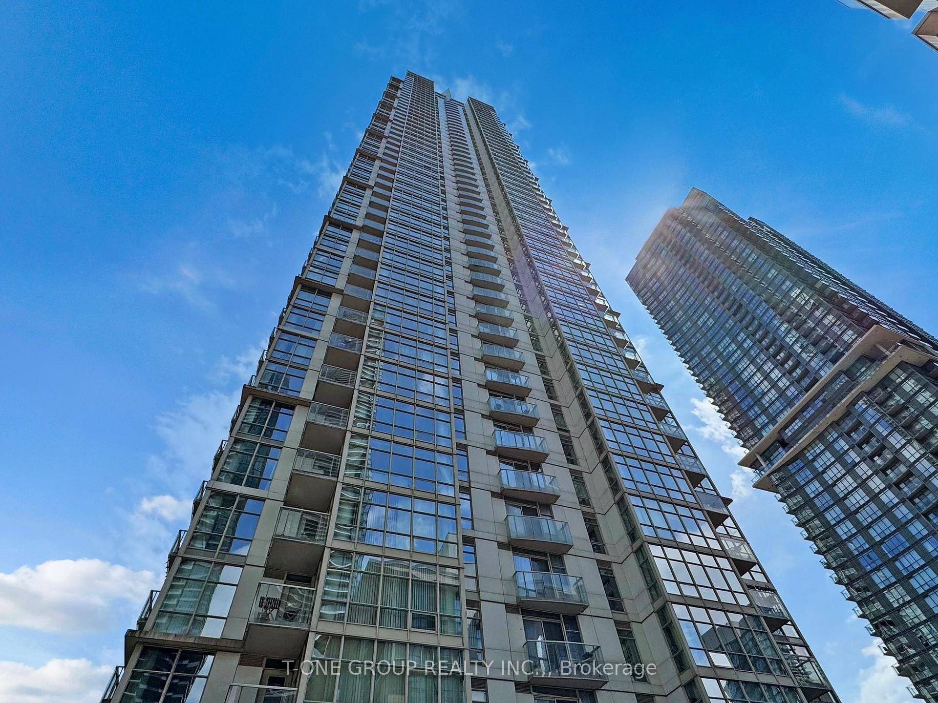 Beautiful west facing 1 Den suite 665 Sq Ft balcony at Harbour View B Front amp ; Spadina, featuring stunning views of the lake and Island Airport through floor to ...