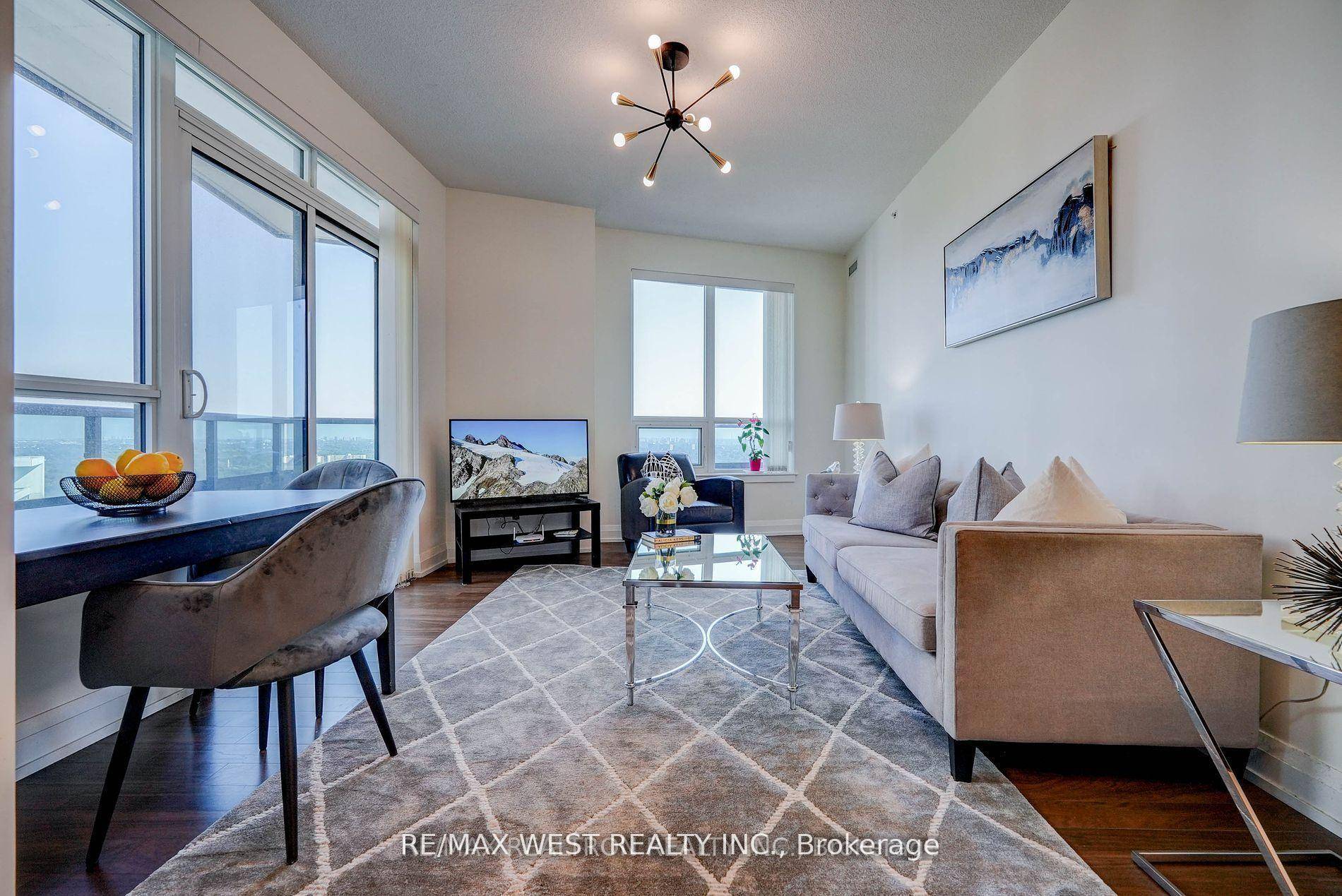 Fabulous 2 bedroom unit in the prestigious World On Yonge corner unit, high ceiling, bright, wrapped around balcony.