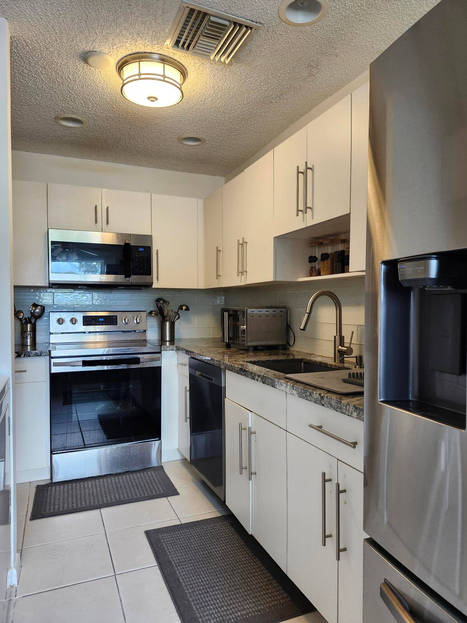 Beautifully updated Condo is located just 3 miles to the Beach.