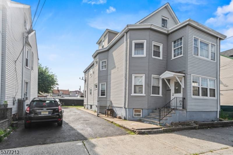 WELCOME TO THIS 2 FAMILY HOME IN A PRIME LOCATION OF PATERSON !