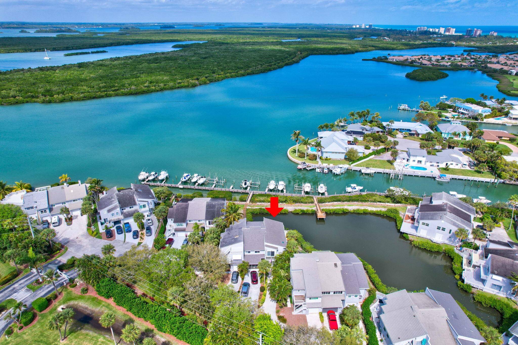 Wait until you see the breathtaking water views from this stunning townhome one of the best in the entire community with a private 30' boat dock and lift.