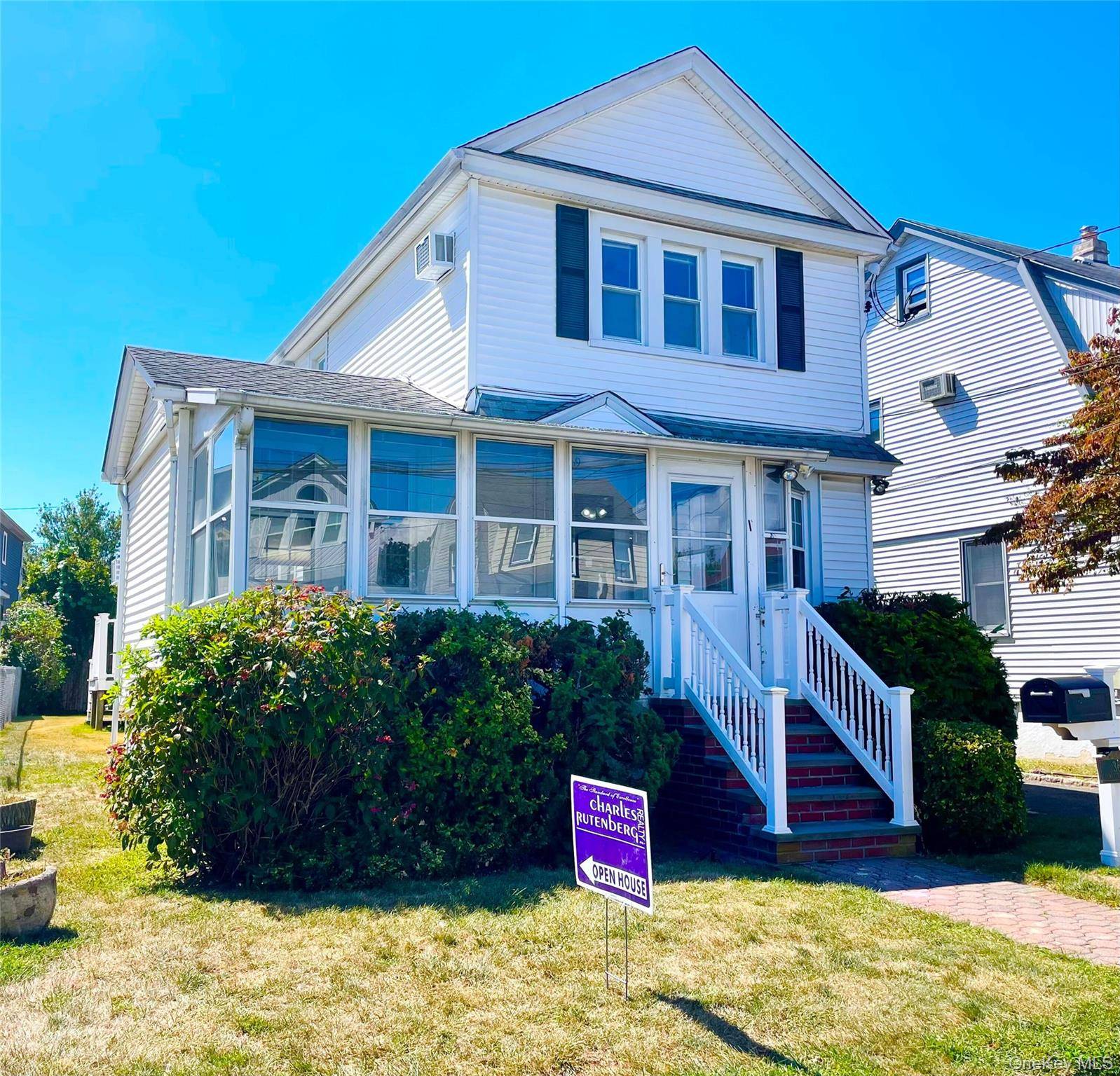 Welcome to this charming Colonial with Flexible layout Potential 5 Bedrooms with two and a Half Baths located in the heart of Hewlett !