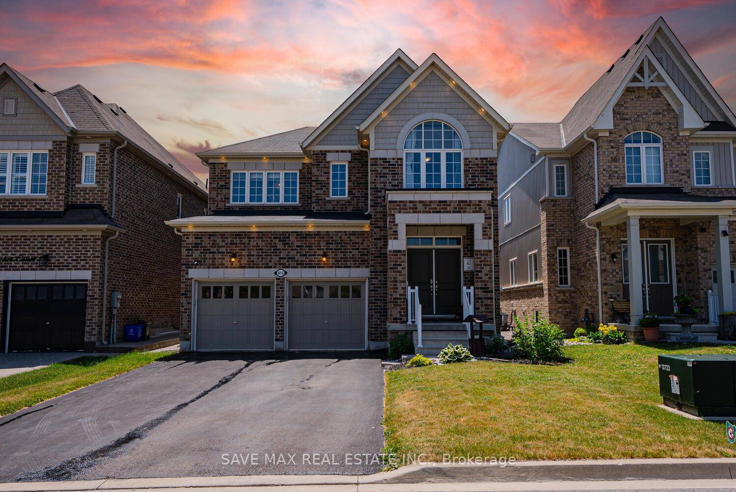Only 6 years old, this stunning all brick home sits on a premium 40 ft lot with no sidewalk, providing extra parking and excellent curb appeal.