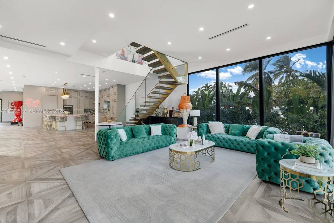 Step Inside With Me ! This contemporary waterfront residence located on the gated island of Biscayne Point was reconstructed in 2022 by a meticulous owner.