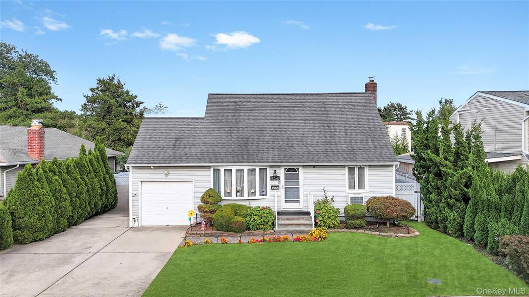 Step into this Beautiful Expanded Cape in the heart of Bethpage, boasting 3 spacious bedrooms, 3 full bathrooms, and a fully finished basement with a private outside entrance.