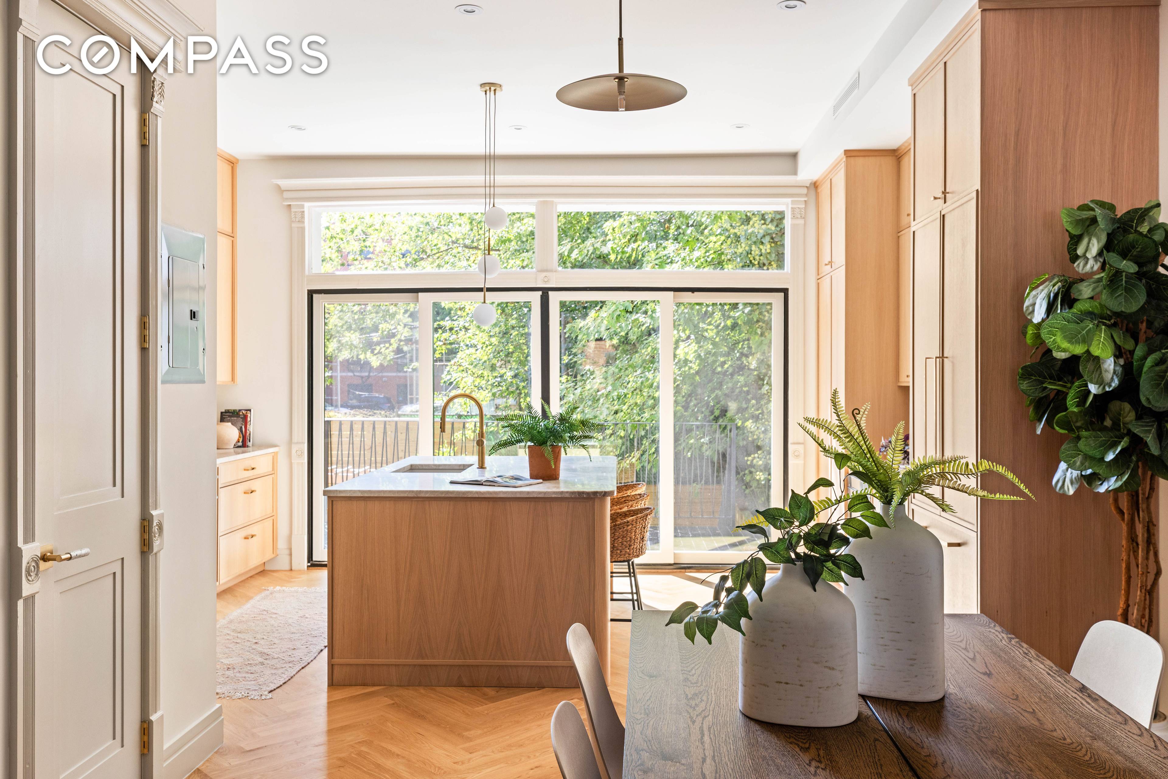 Built in 1899, 444 Quincy Street is a meticulously reimagined three story, two family brick townhouse that blends historic character with modern luxury.