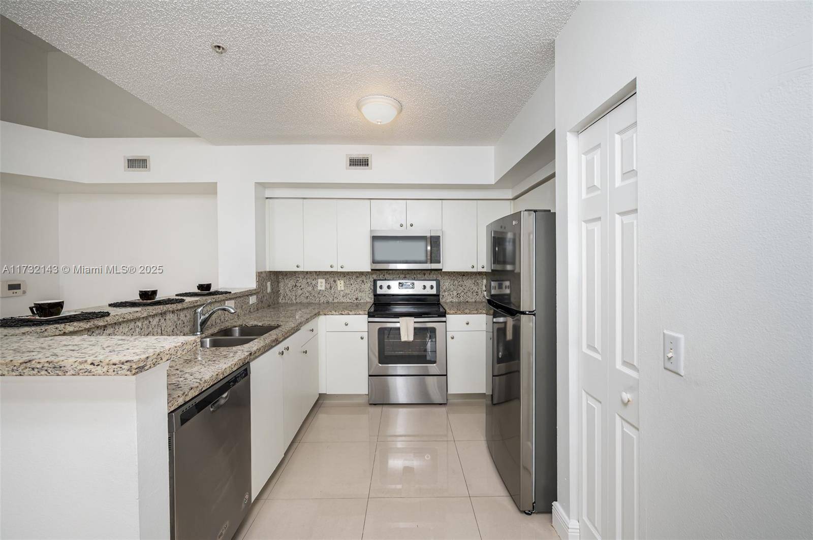 Beautifully renovated 2 bedroom, 2 bathroom condo in a highly sought after gated community.
