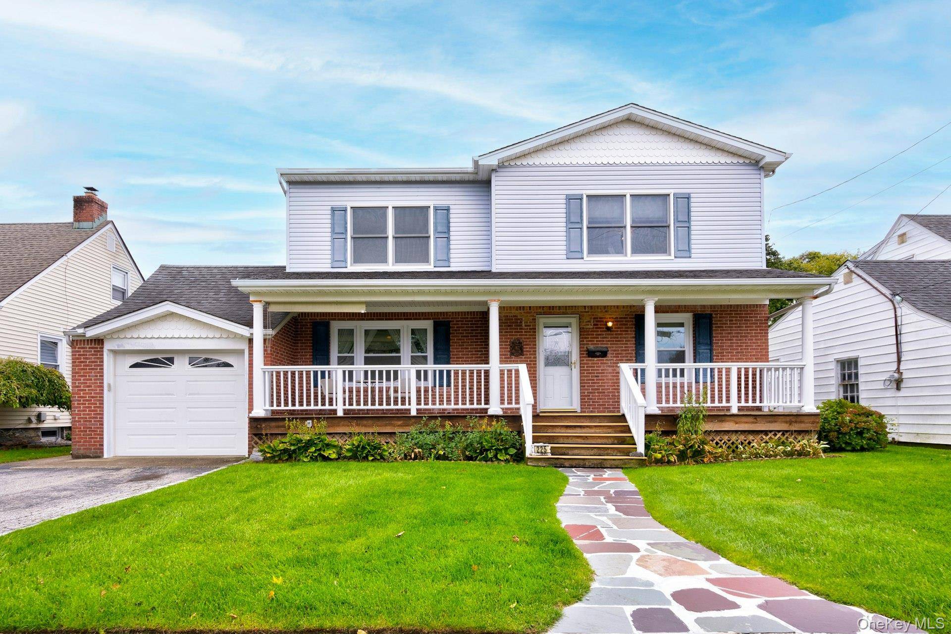WELCOME TO 225 CHERRY STREET A spacious colonial in Farmingdale Village.