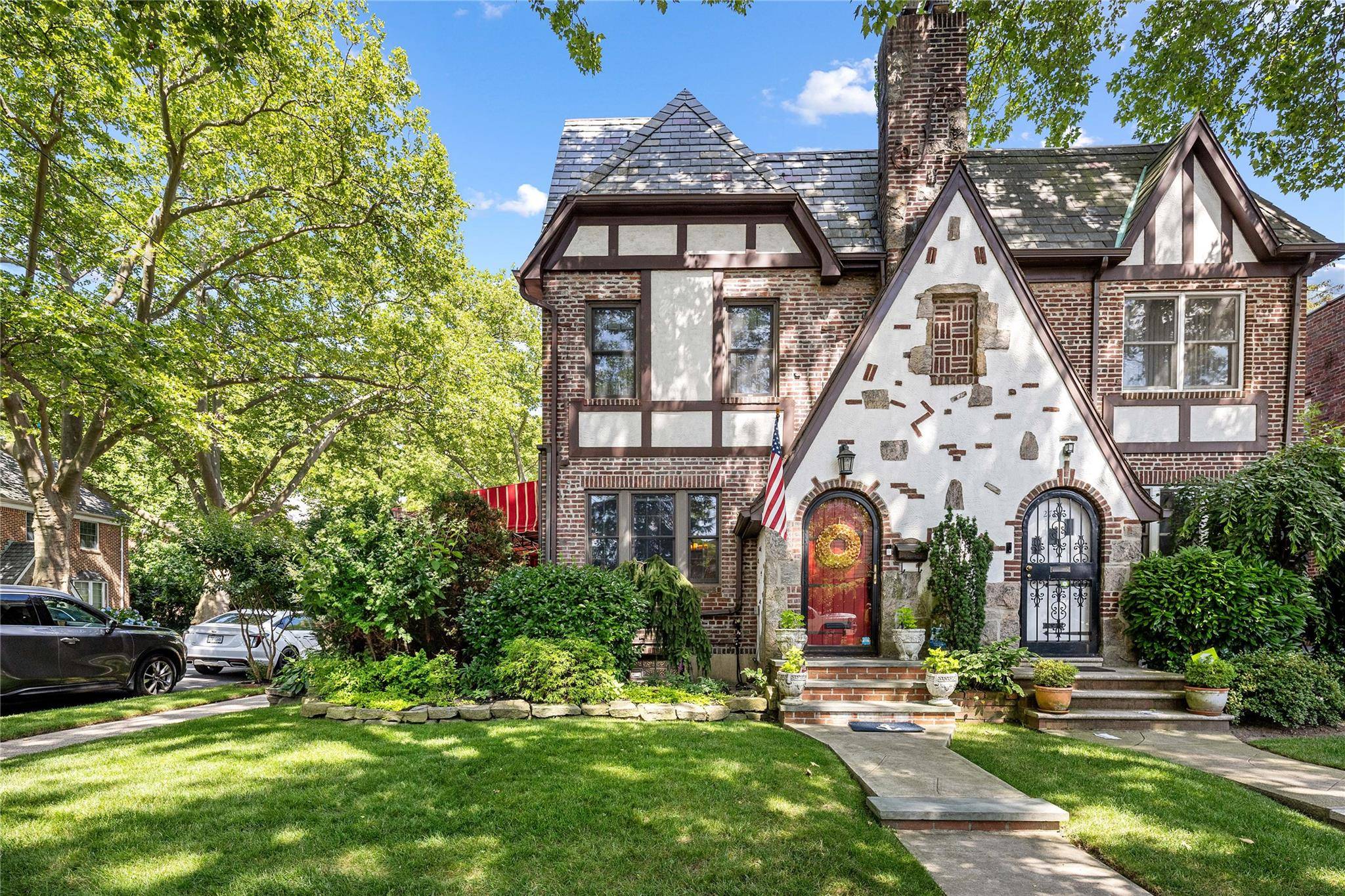 Welcome to this charming all brick English Tudor nestled in the heart of North Flushing.