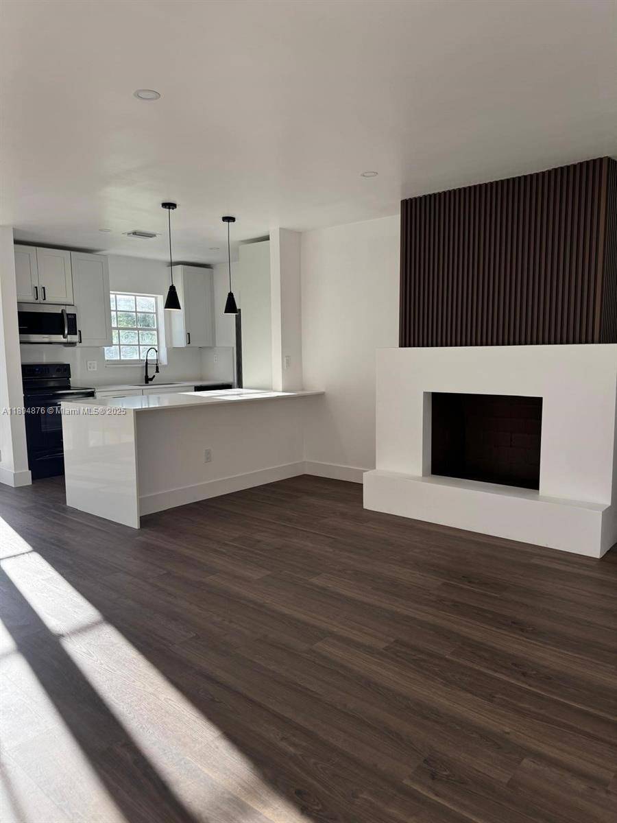 Beautiful fully renovated 3 bedroom, 2 bath single family home featuring a new roof, central A C, modern bathrooms, and a bright open layout filled with natural light.