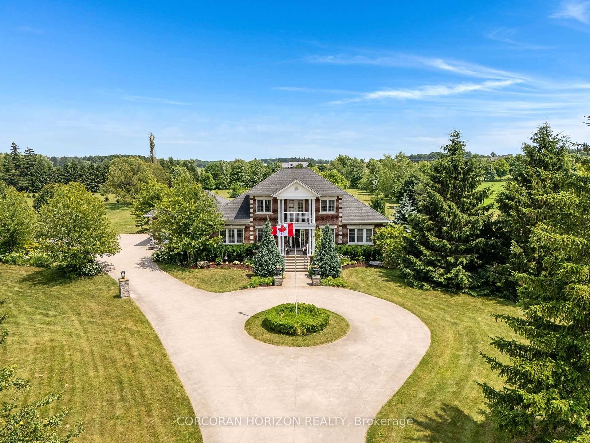 Welcome to 2865 Herrgott Road, a rare opportunity to own a timeless luxury estate on nearly 5 acres of manicured countryside, just minutes from city conveniences.