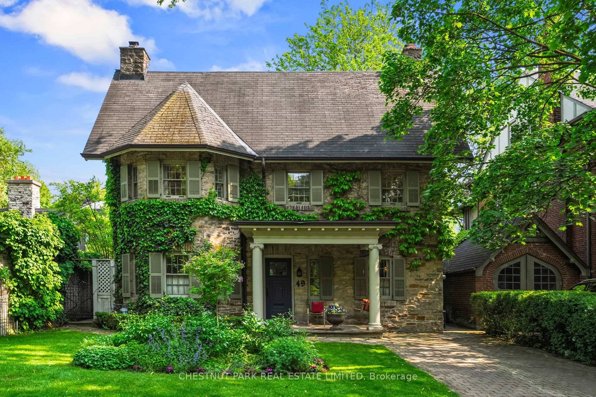 Welcome to this most iconic ivy clad stone home in prime heritage Southwest Rosedale.