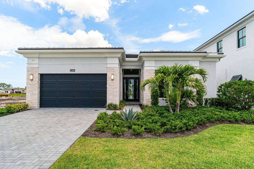 Welcome to your dream home in Artistry Palm Beach where luxury and lifestyle meet with over 370K in high end upgrades, including a custom pool spa, travertine deck, and full ...