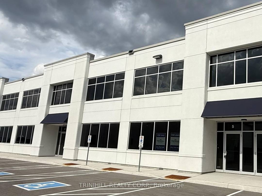 A VERY RARE OPPORTUNITY TO OWN INDUSTRIAL UNITS WITH FENCED AND GATED REAR YARD FOR OUTSIDE STORAGE AND WITH OVERSIZED DRIVE IN DOORS.