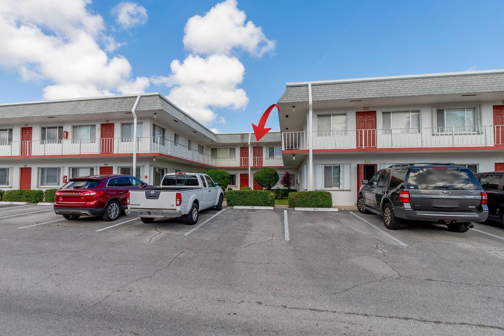 Welcome to 3362 Cynthia Lane 211 in Lake Worth Beach a charming second floor condo located in the highly desirable Murry Hills community along the serene shores of Lake Osborne.