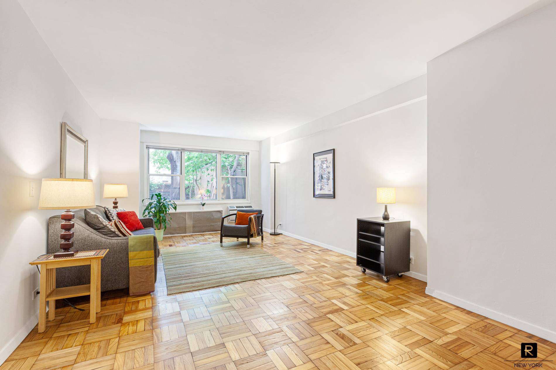 Lush Views and Abundant Space This extra large pin drop quiet alcove studio provides a sanctuary for spacious living in one of the most sought after full service Coops in ...