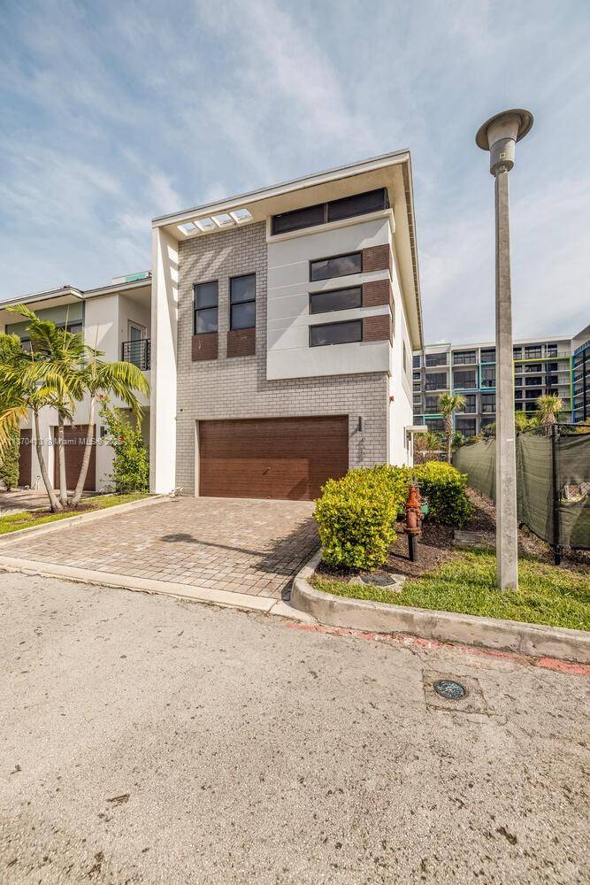 This stunning corner unit townhome offers 3 bedrooms, 2.