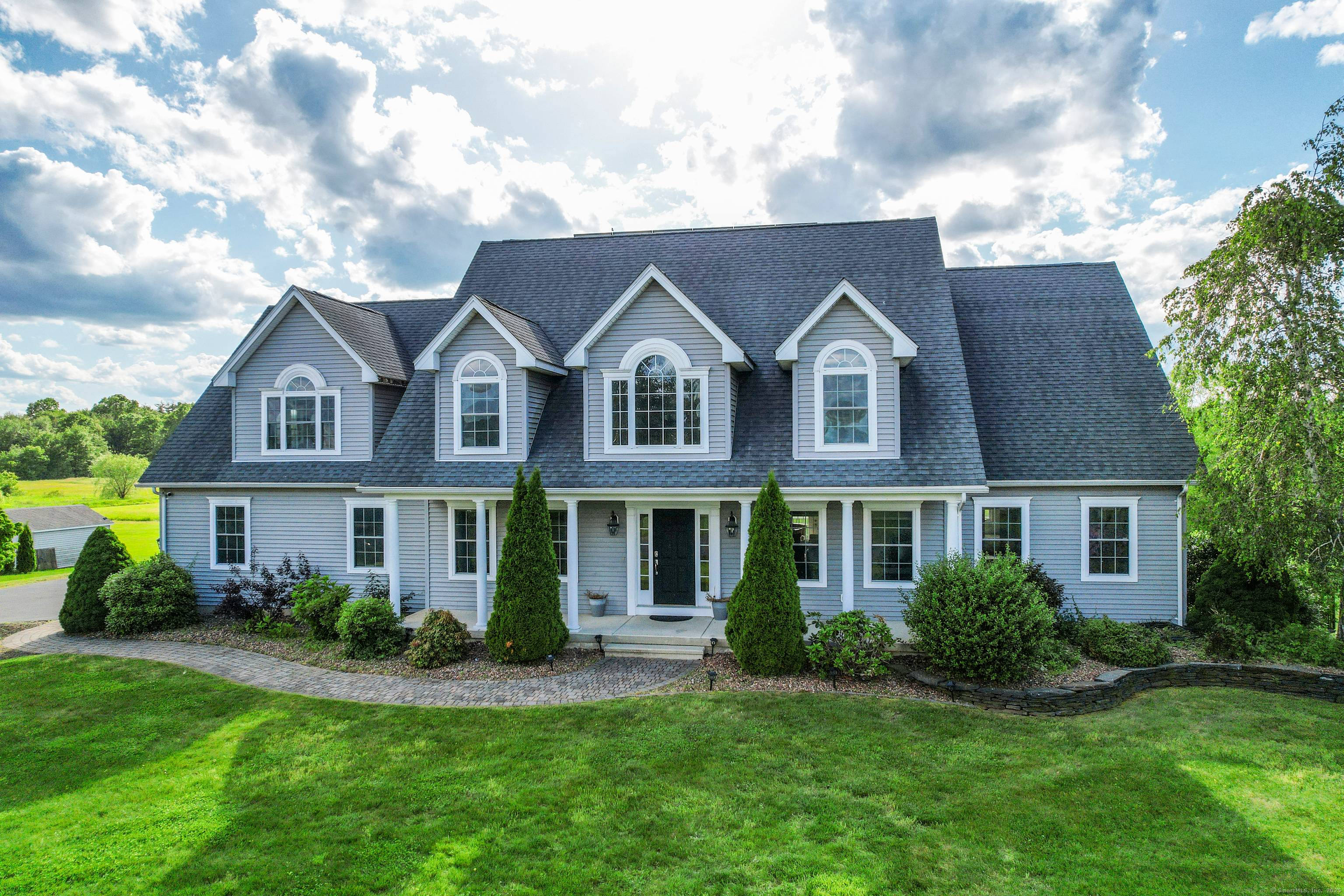 Welcome to 44 Farmstead Lane an exceptional Colonial in one of Suffield's most desirable neighborhoods.