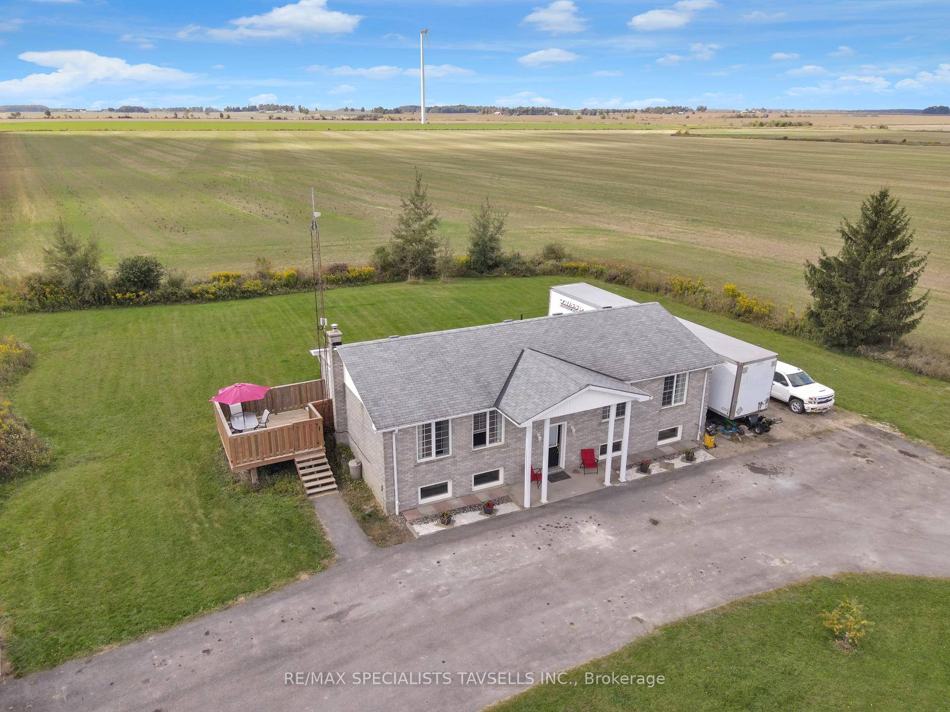 This bungalow home is set on just over an acre in a very private setting with no homes behind.