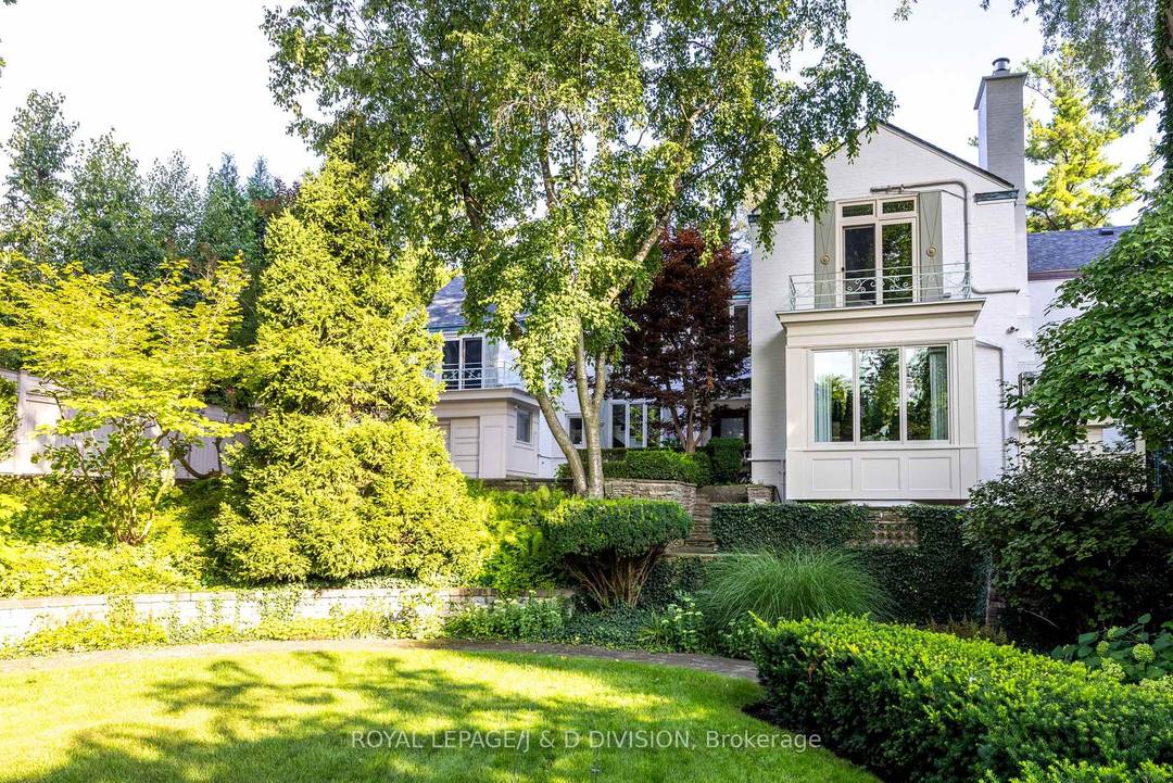 A rare opportunity to own a secluded ravine residence, gracefully set back from the street on an expansive 1 2 acre lot in one of Toronto's most private enclaves.