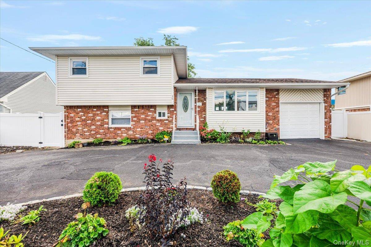 Welcome to this beautifully updated 4 bedroom, 2 bath split level home located in the heart of Farmingdale, just minutes from Bethpage State Park.