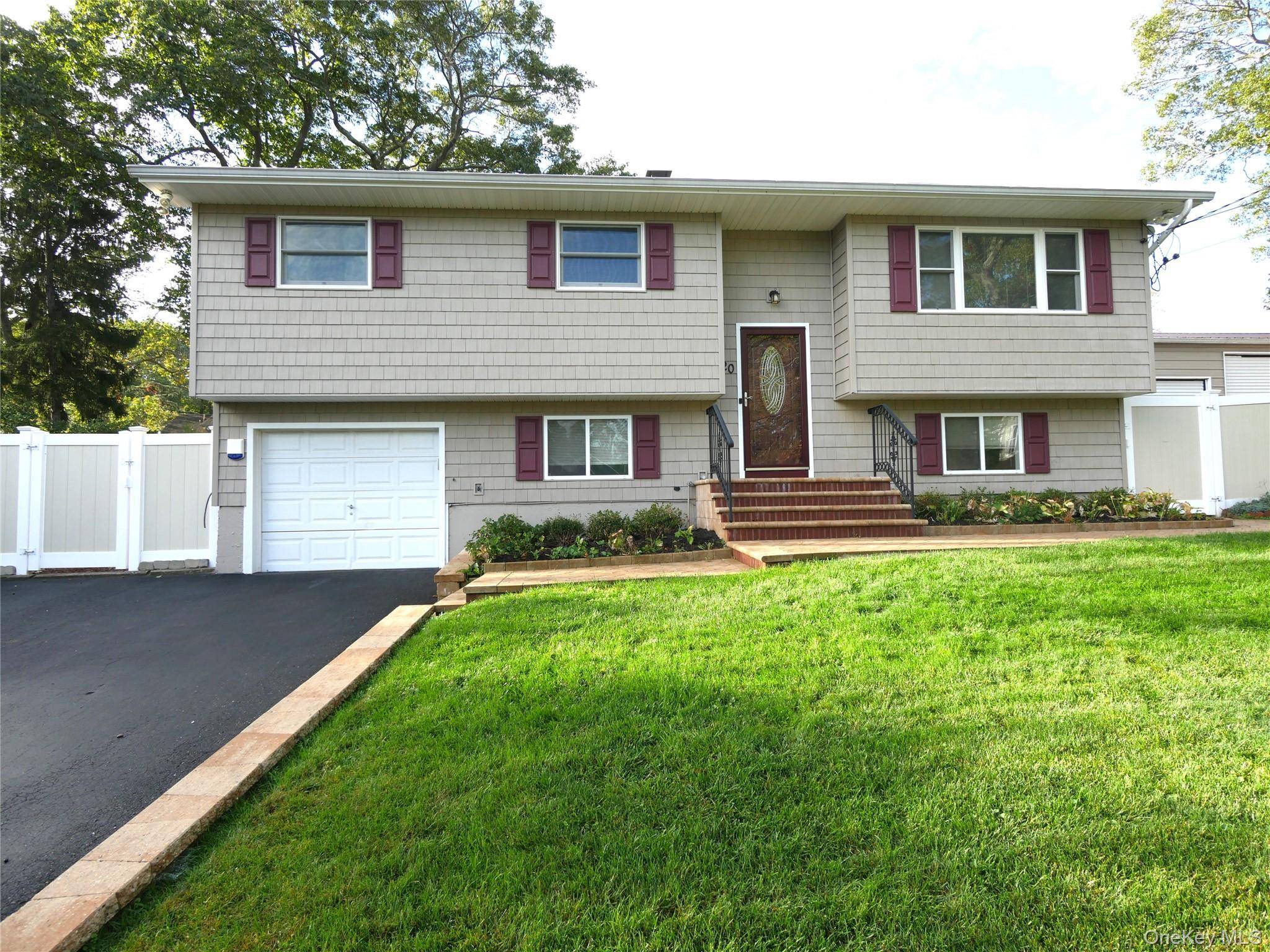 The possibilities are endless with this 4 Bedroom, 2 Bath Hi Ranch, offering a unique opportunity seldom found on the market.