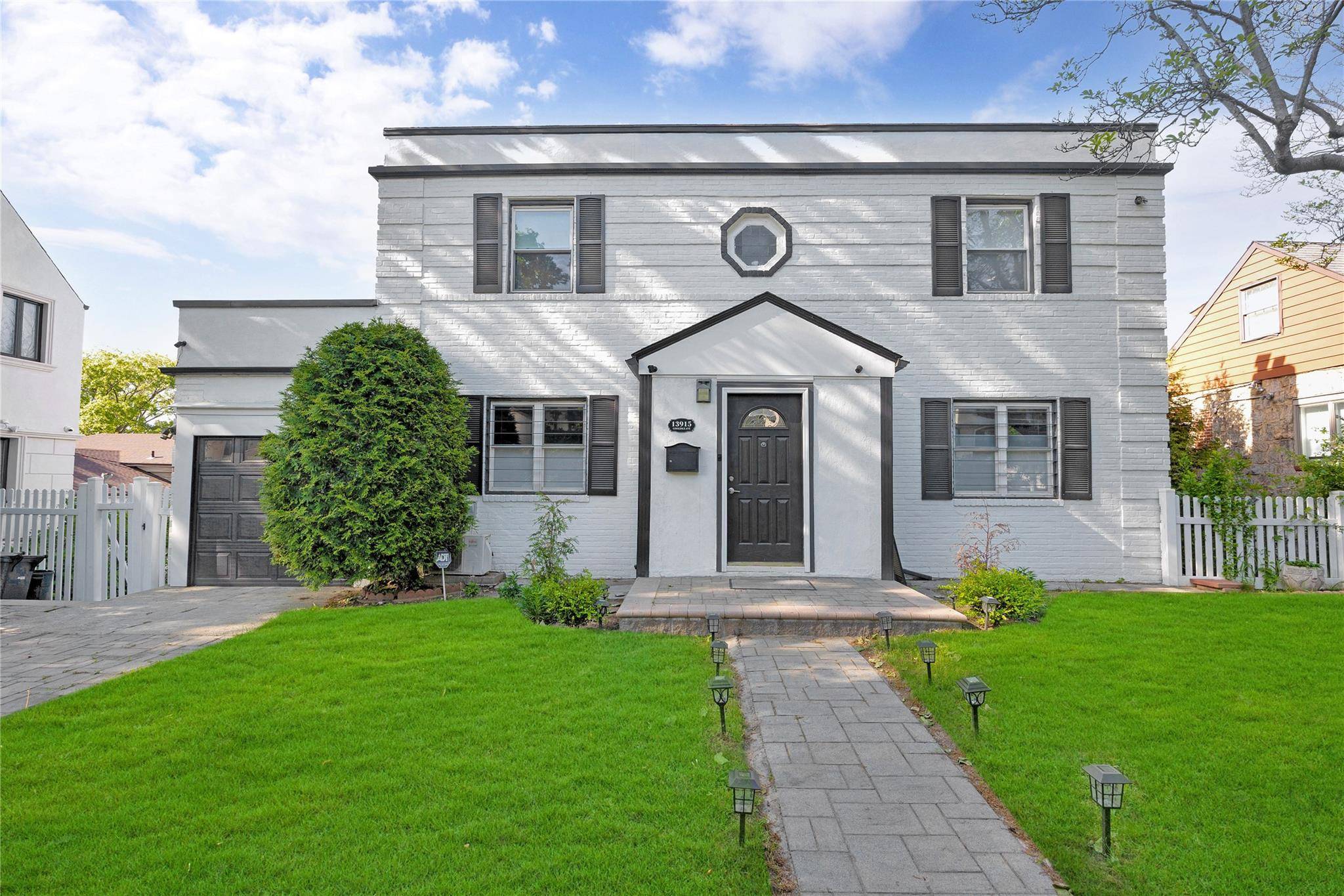 Welcome to your dream home on a tranquil tree lined street !
