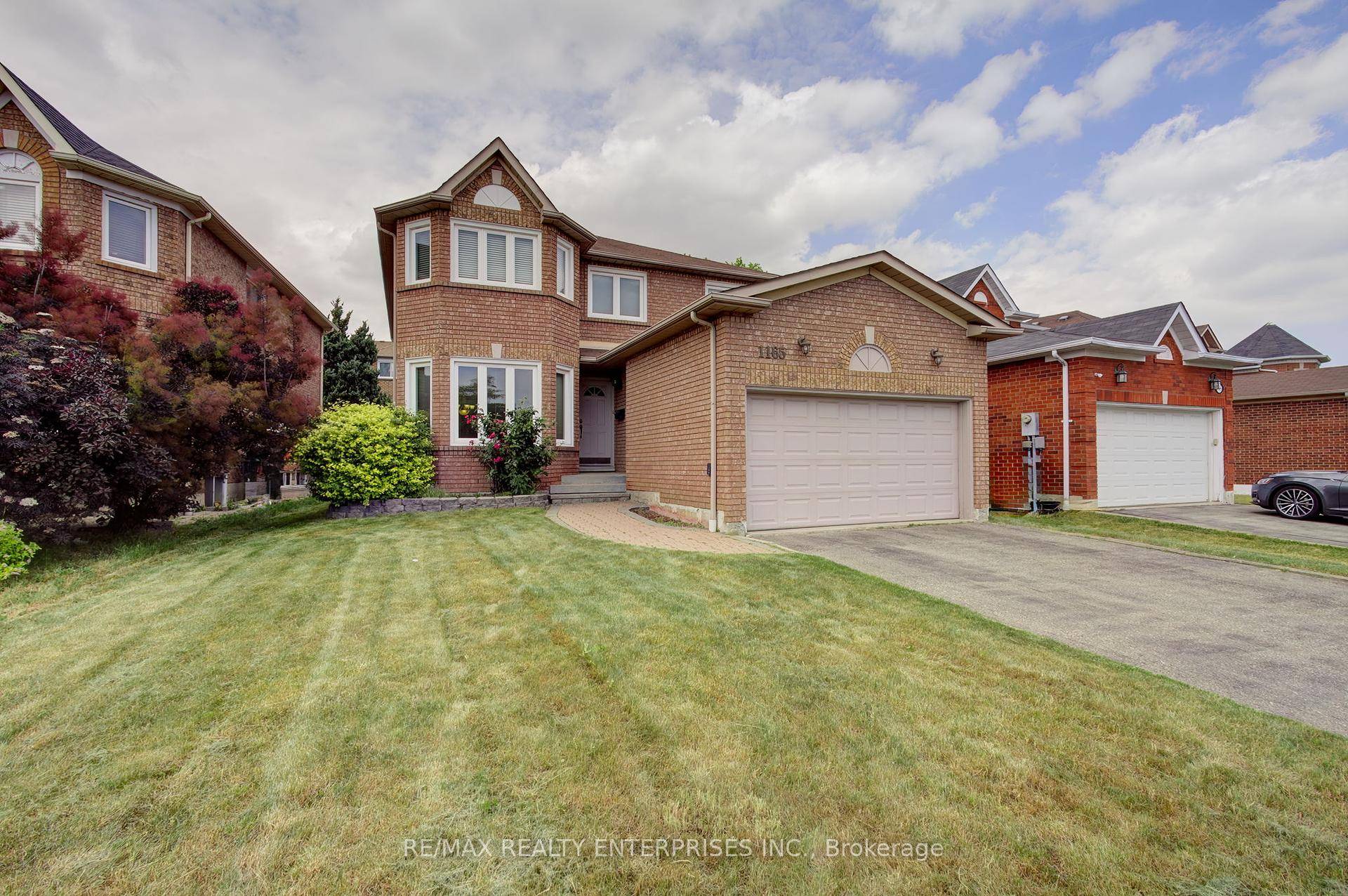 Location ! Location ! Detached, 4 bedroom and main floor den and large family room with Double Car Garage !