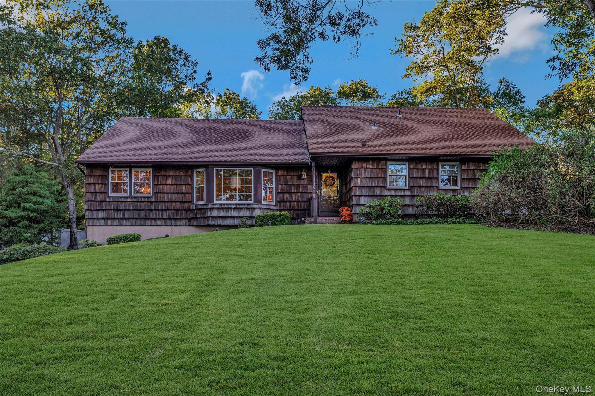 Welcome to this beautifully updated Expanded Cape in the heart of Port Jefferson Village.