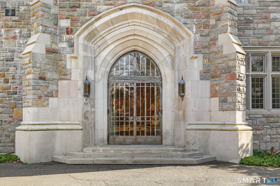 A rare opportunity to live in a granite and limestone estate of historic significance, just moments from the heart of downtown New Canaan.