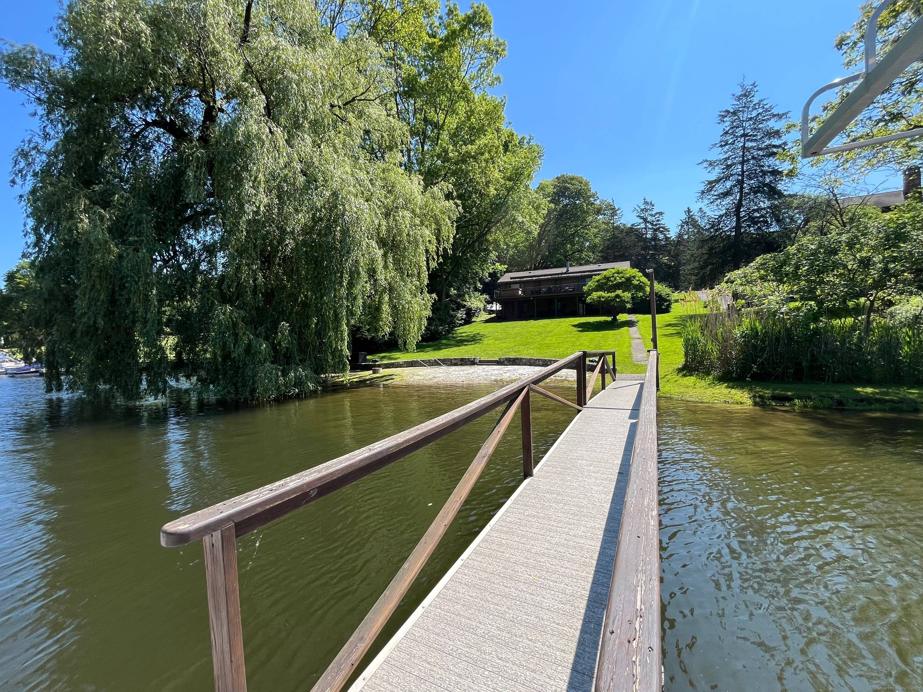 Pull into the end of the cul de sac and enjoy your just under half acre of privacy with 100' DIRECT LEVEL WATERFRONT on Squantz Pond in the private lake ...