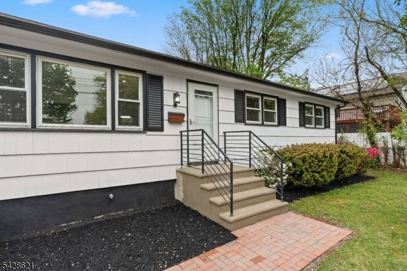 Beautifully renovated ranch with modern finishes throughout !