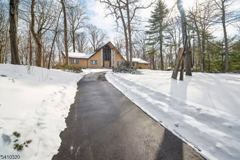 Set on a quiet tree lined street in Warren, this contemporary residence at 137 High Oaks Drive offers a rare blend of space, light, and flexibility.