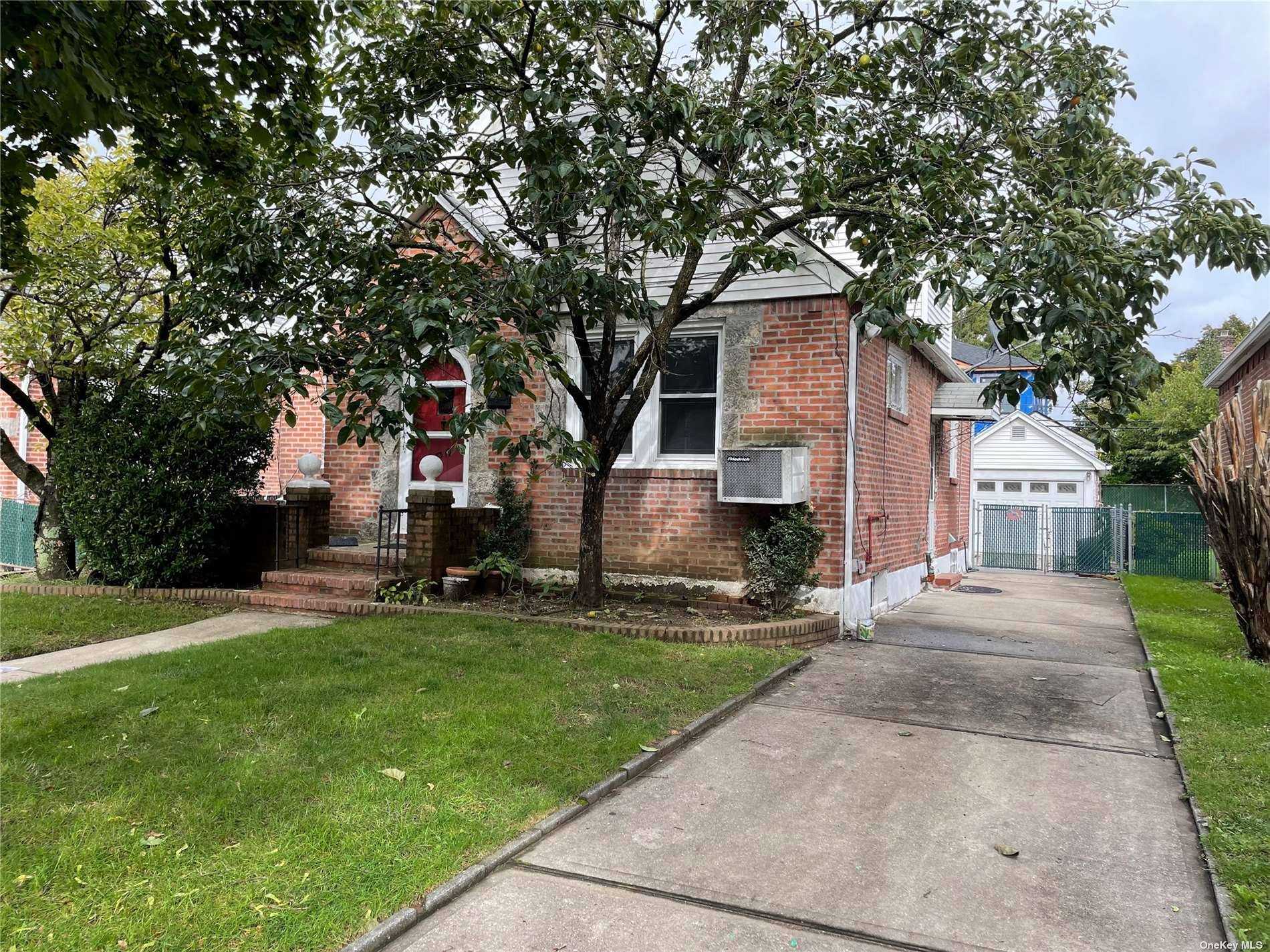 Lovely Cape 4 brs, 2 fbths, finished basement, New Hardwood floors, W D, use of driveway and backyard, Close to all transportation, shopping and houses of worship.