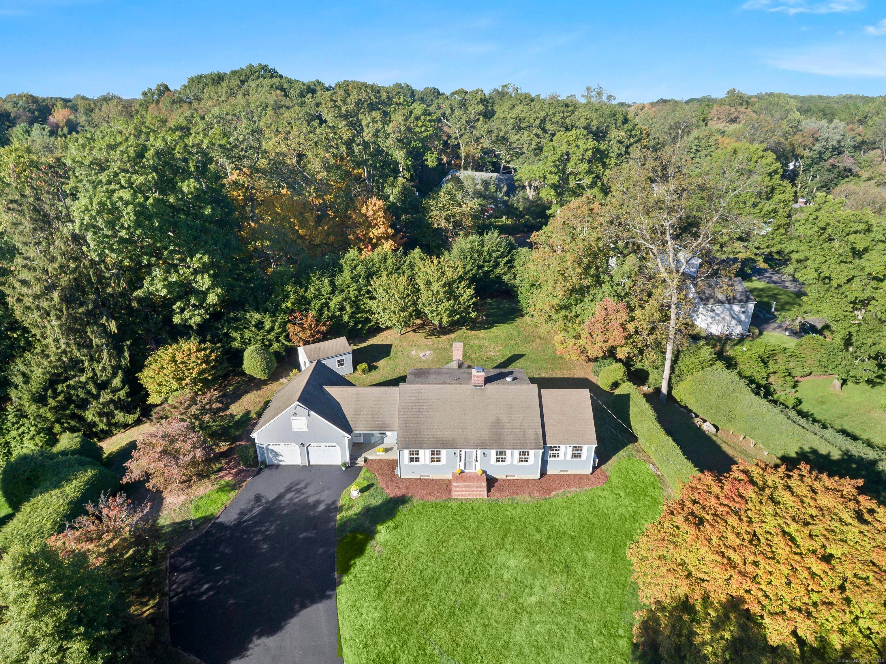 A picturesque, expanded and impeccably renovated Cape Cod home located in highly desirable Southport set off far from road awaits.