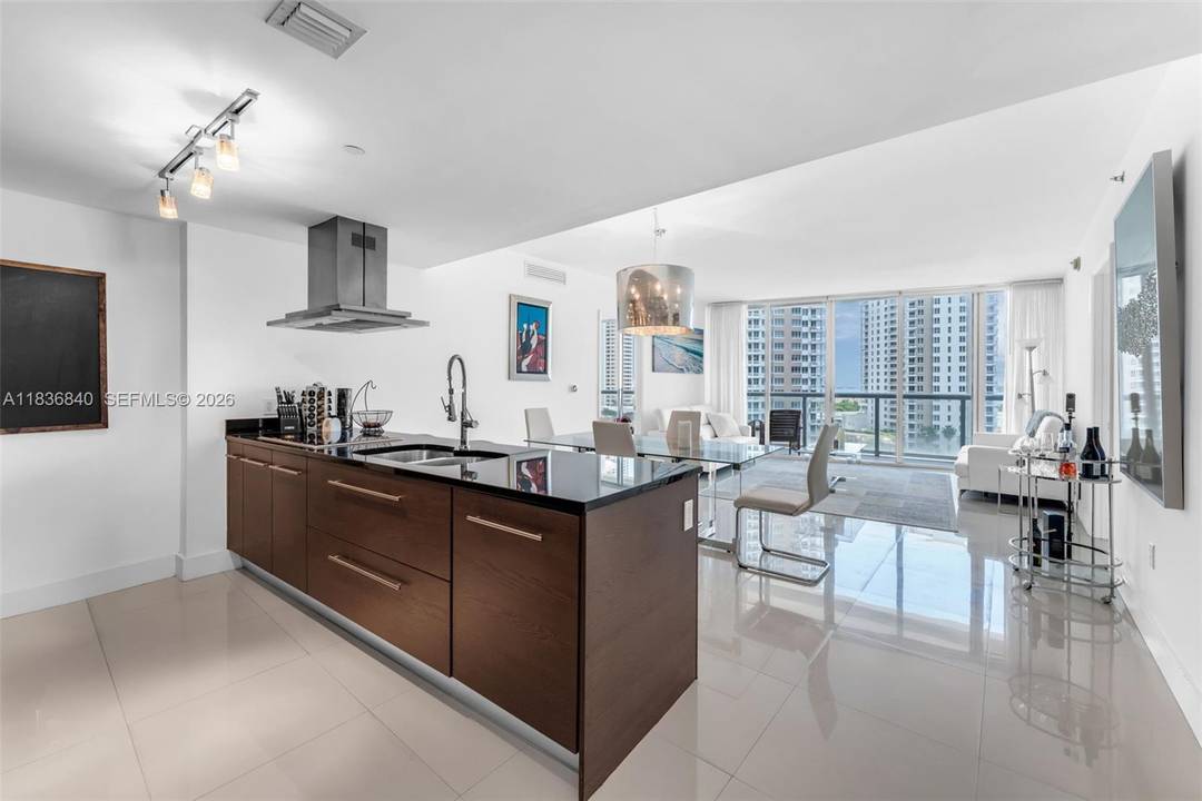 Wake up to breathtaking, unobstructed views of the water and the Miami skyline from this oversized 10th floor corner unit at the prestigious Icon Brickell Tower 2.