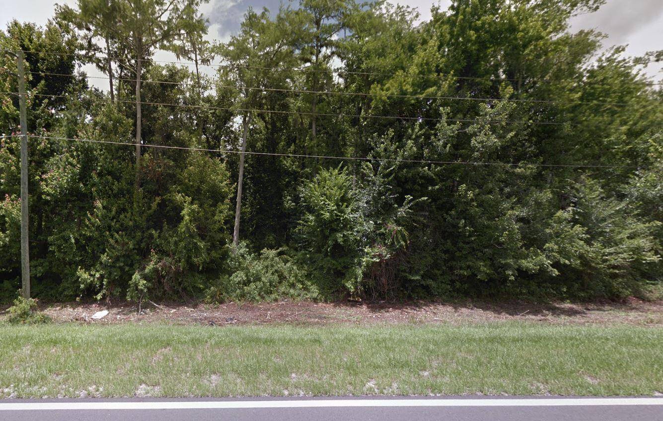 Don't miss the opportunity to own a half acre in the Daytona North Community, conveniently located on a paved road.