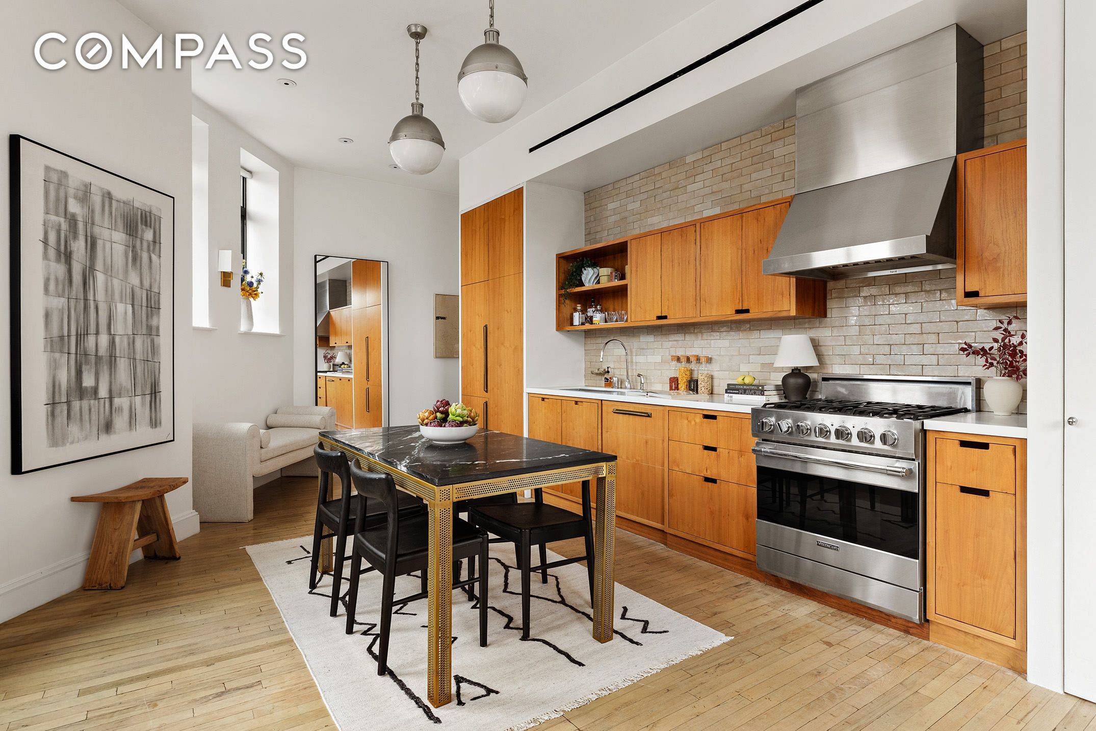 Embrace voluminous light and air in this stunning, architect renovated one bedroom loft in a full service West Village building.