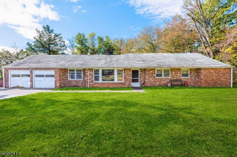 Spacious 4 bedroom, 2. 5 bath ranch set on a beautiful flat acre of land.