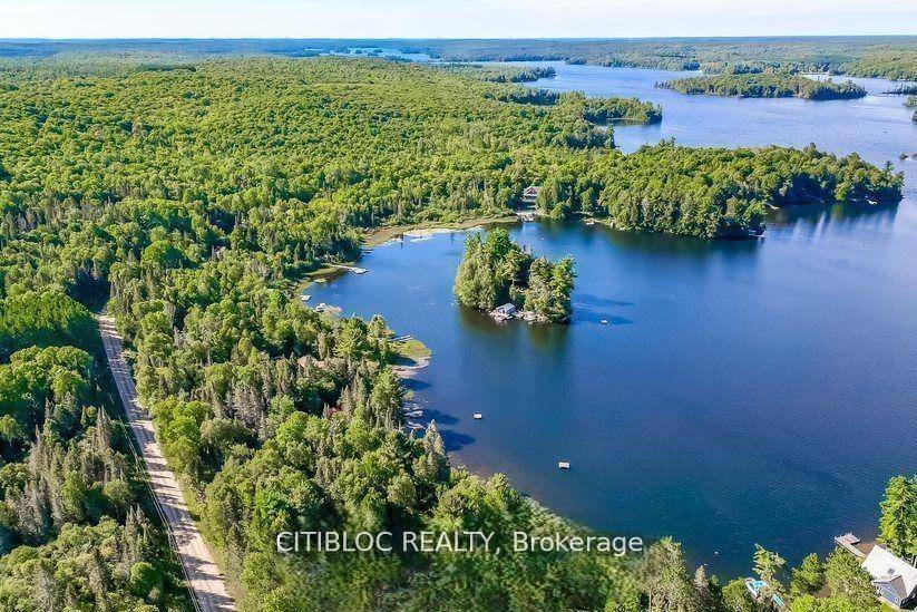 Welcome to 1153 Riding Road Ranch, your charming retreat in South River, just a stones throw from the serene Eagle Lake.