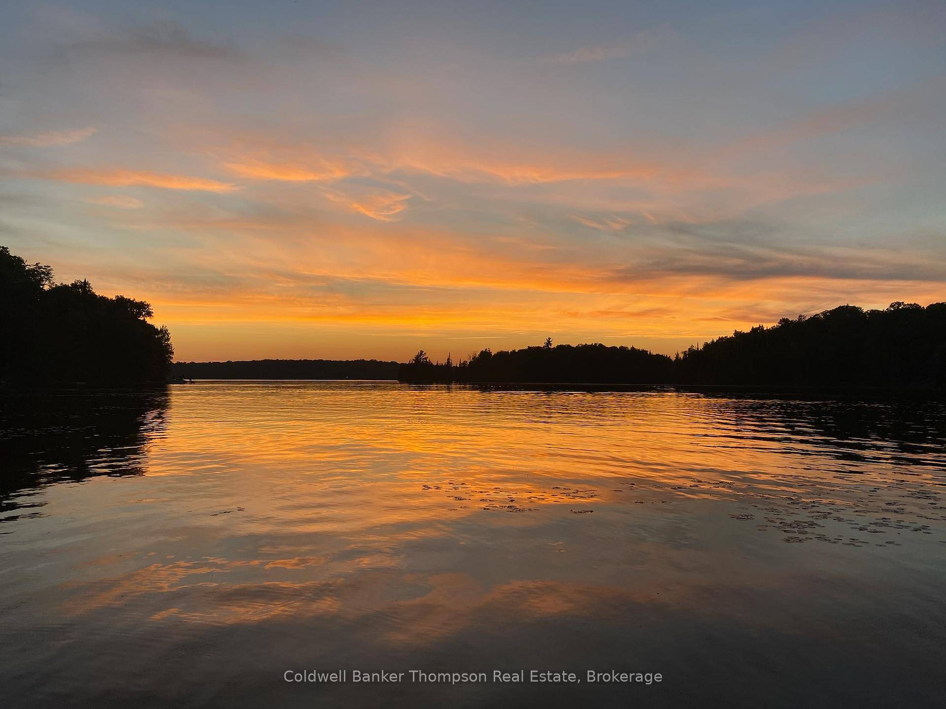 Enjoy the best of lakeside living on this stunning 1.