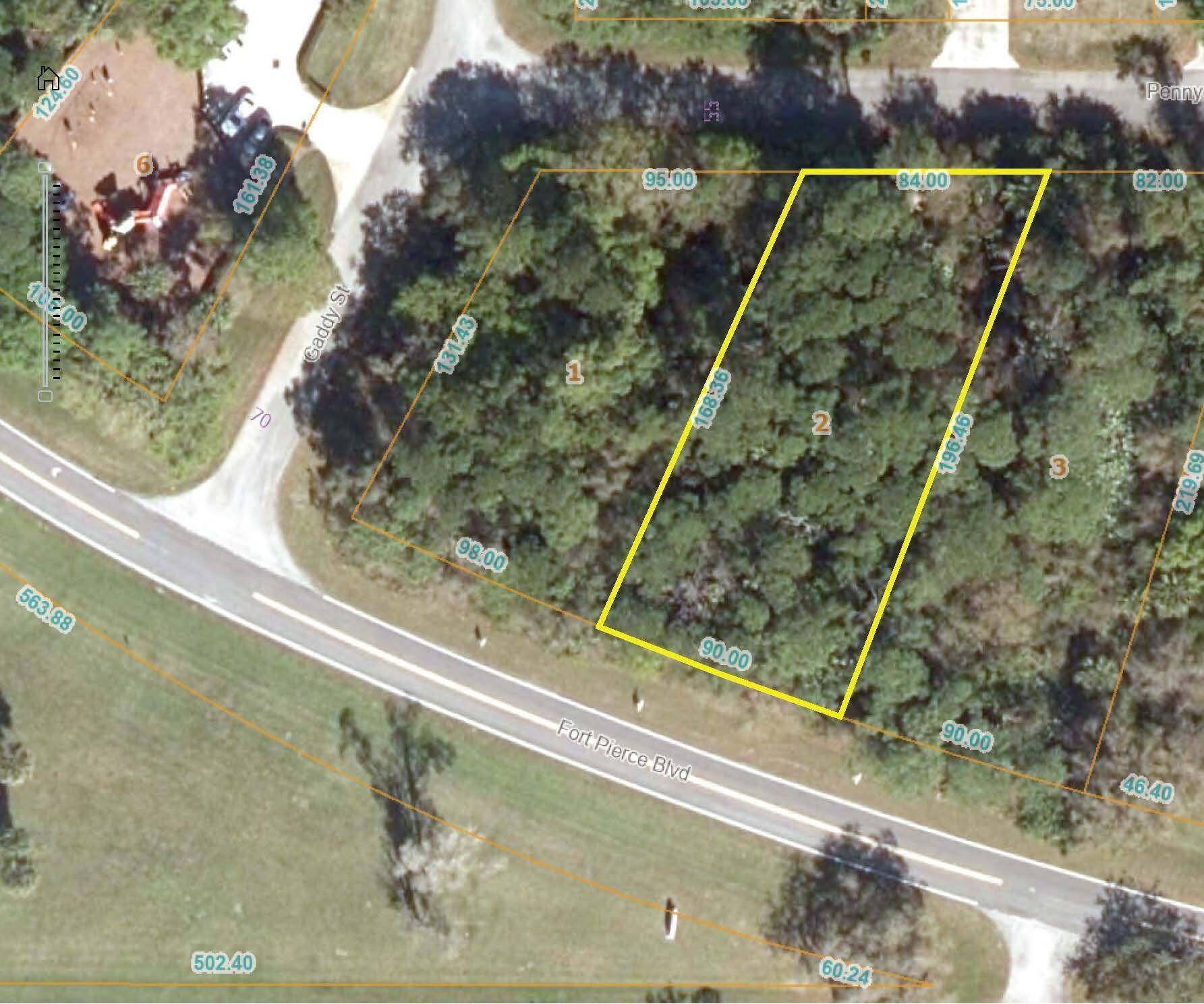 . 34 ACRE VACANT RESIDENTIAL OR COMMERCIAL BUILDING LOT ZONING IS COMMUNITY NEIGHBORHOOD WHICH ALLOWS FOR COMMERCIAL USE OR CAN BE A RESIDENTIAL BUILDING LOT.