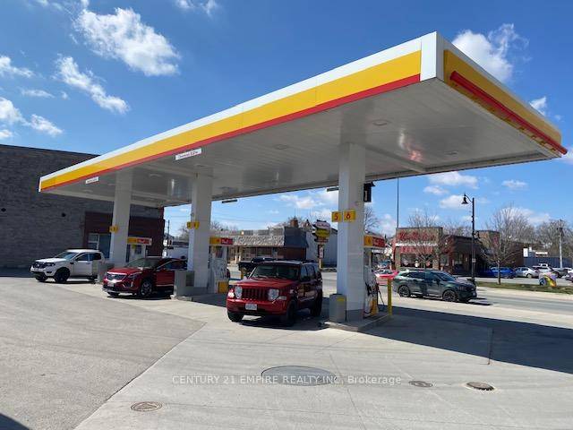 Shell Gas station offered for sale in heart of Napanee Downtown, with property, with 3Gasoline Pumps Chip and card reader enabled under Canopy, Convenience Store, 2 Bay Coin Car Wash, ...