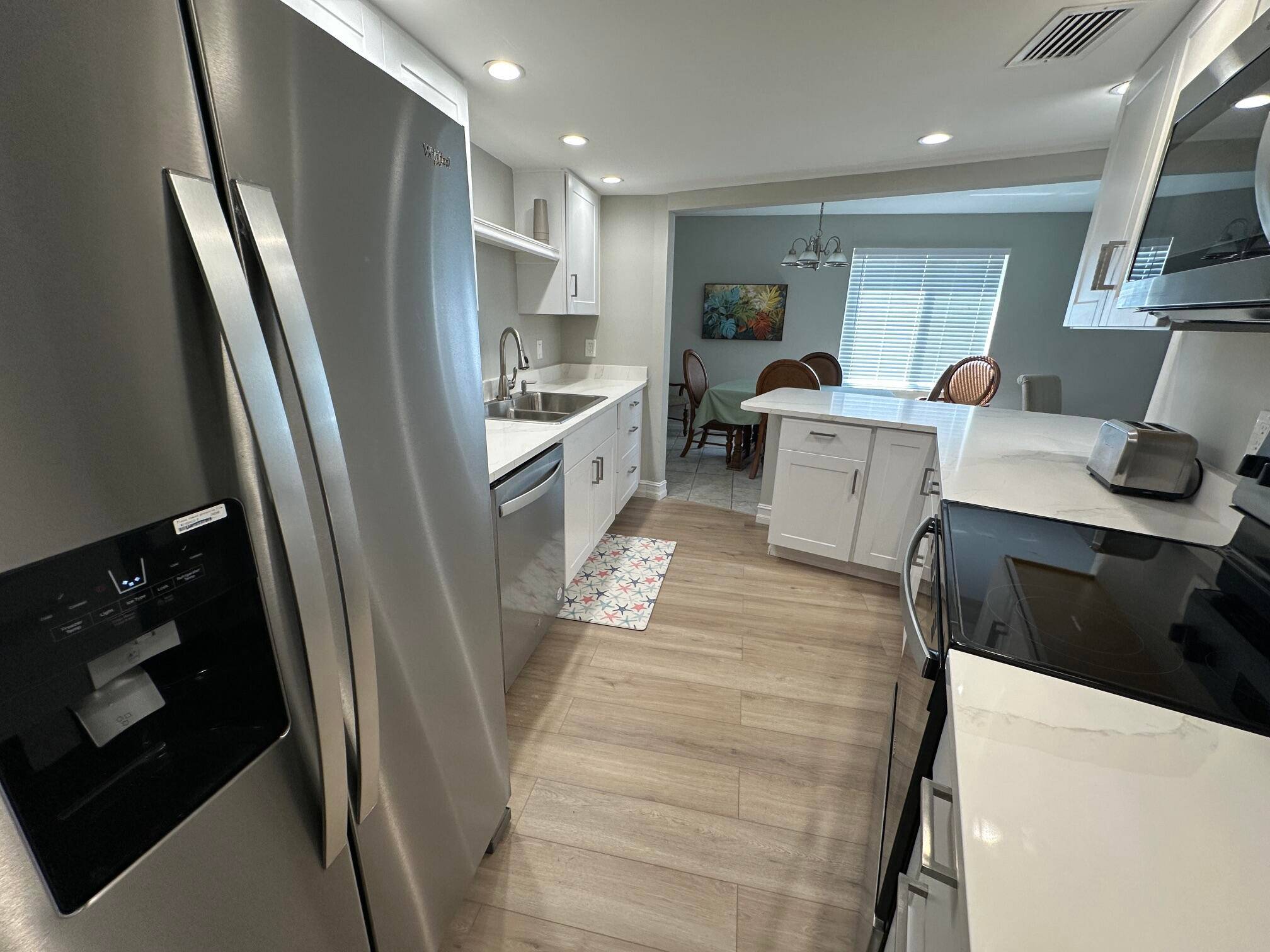 Completely renovated first floor condo ready and waiting for your toothbrush !